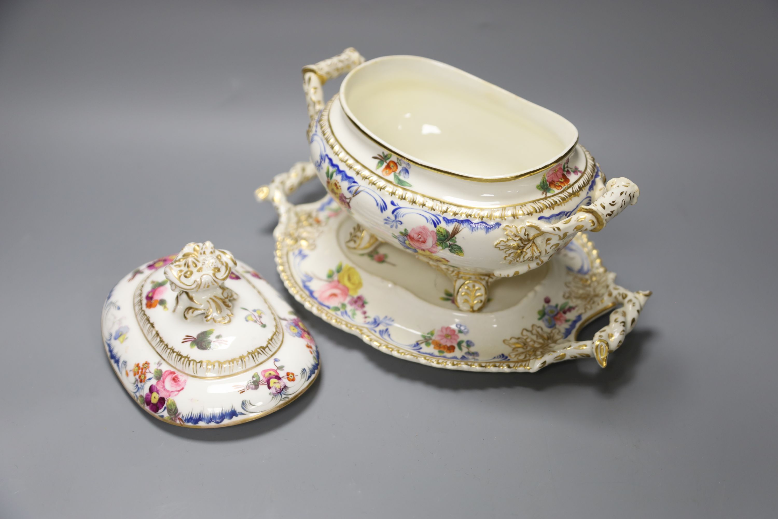 A pair of Ridgway porcelain tureens and integral stands and tureen cover and stand, height 18cm, a Royal Copenhagen figure and a Rosent